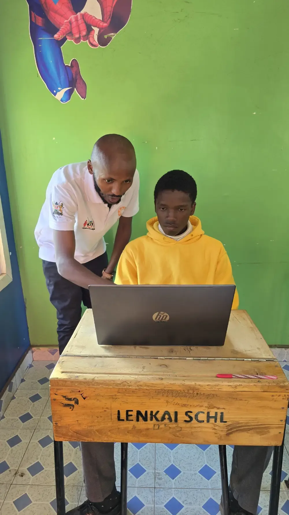 Mathew Macharia teaching at the Kids AI Bootcamp