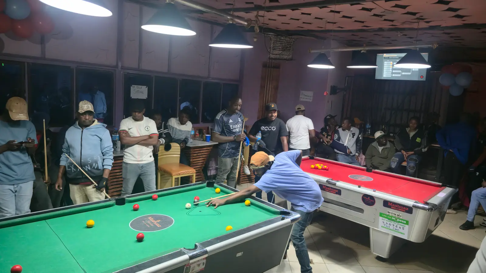 The crowd watching a rack at a Moran Pool Club tournament